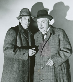 Nigel Bruce as Watson and Basil Rathbone as Sherlock Holmes